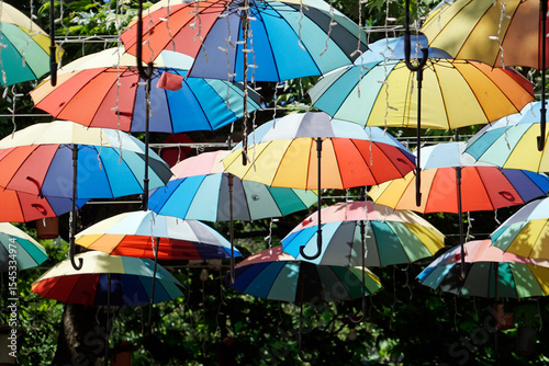 Wallpaper Mural Colorful umbrellas hang above lively Istanbul street Torontodigital.ca