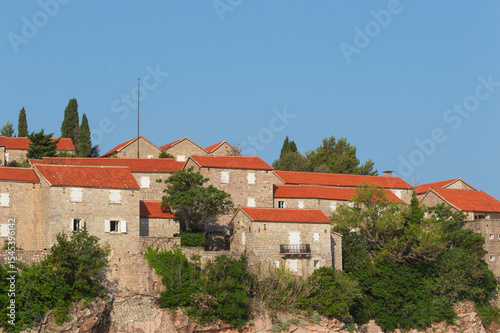 Wallpaper Mural A fragment of the stone medieval fortress of Sveti Stefan island-hotel, on the Adriatic coast, Montenegro. Details. Horizontally Torontodigital.ca