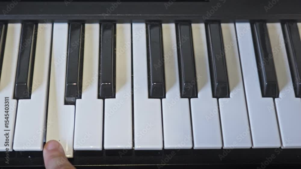 Electric Piano Playing Keys Up And Down From C to B White Male Hand