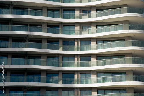 Modern architecture showing repeating rounded balconies and windows