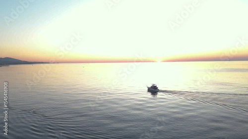 Timelapse of a boat in the marmara sea during sunset.