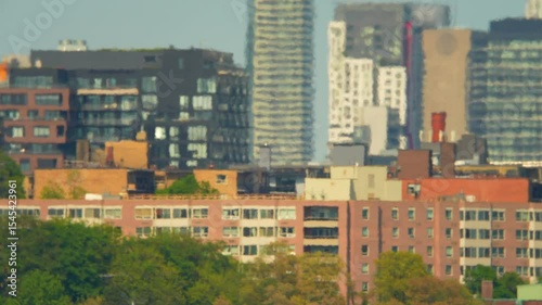 View at city in Eastern Canada during climate change, record-breaking heat wave in one of world's hottest cities. Increased respiratory and cardiovascular distress due extreme heat dome.