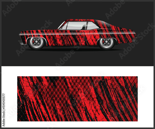 Classic Car with Red and Black Graphic Wrap Design on Dark Background