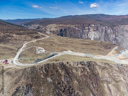 Construction of a new road to the Chulyshman River valley. Mountain pass Katu-Yaryk. Landscape. Mountain dangerous road.