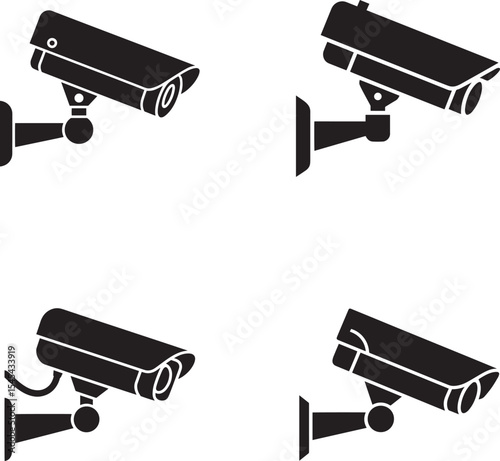 Four Security Cameras Mounted on Walls
