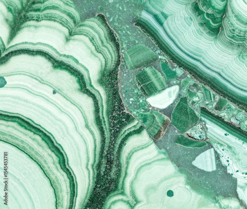 green light and dark structure of malachite close-up