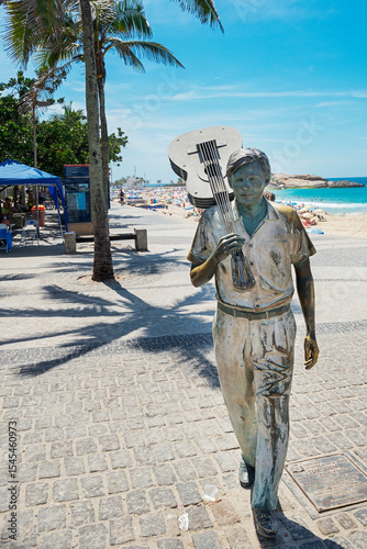 Bronze Statue of Tom Jobim, one Bossa Nova Father, author Girl of Ipanema song, made by artist Christina Motta, Ipanema Beach, Rio de Janeiro, Brazil, 2022