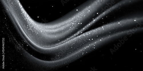 Silver particles flowing on black wavy fabric in slow motion