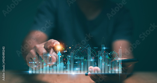 Business data analysis and project management concept. Business planning and strategy to growth. Man holding smartphone with analyze financial graph for investment. Corporate future growth plan.