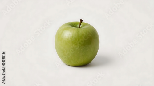 Fresh green apple on white background for food blogs, health articles, recipe books, and nutrition resources. Ideal for healthy living concepts.