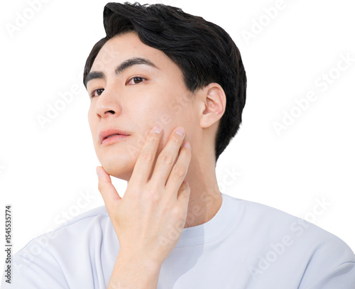 髭の脱毛やスキンケアをする若い男性　クローズアップ　背景透明pngの合成素材