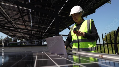 Close-up of engineer's hand testing a solar panel with measurement device, solar energy maintenance and green technology.