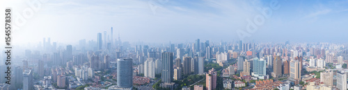 aerial view of Shanghai skyline with heavy fog.