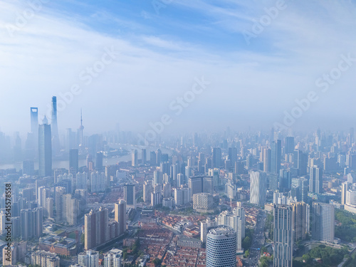 aerial view of Shanghai skyline with heavy fog.