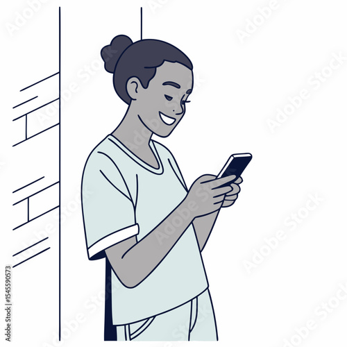 Happy young woman using smartphone near brick wall