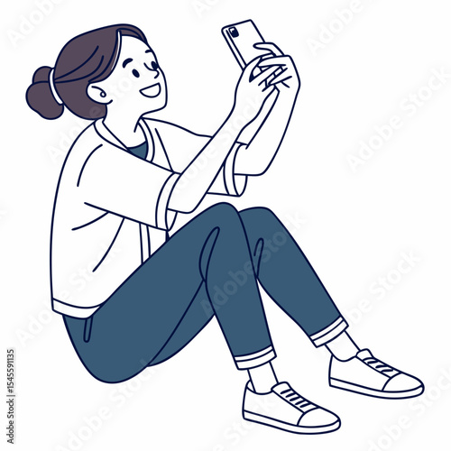 Young woman sitting cross legged taking a selfie on smartphone