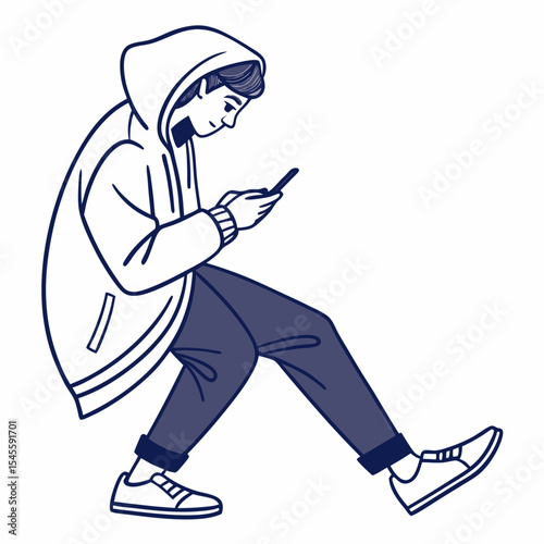 Young person in hoodie using smartphone while walking