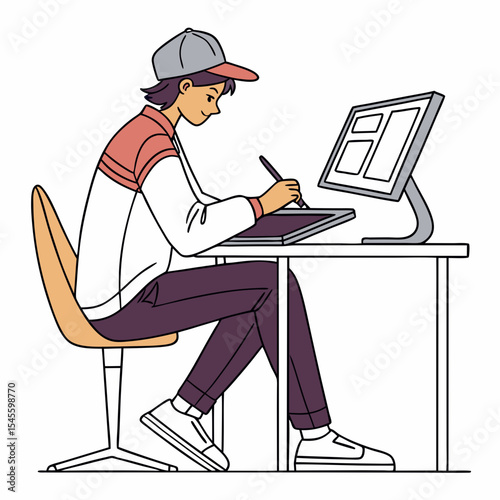 Young artist working on graphic tablet computer