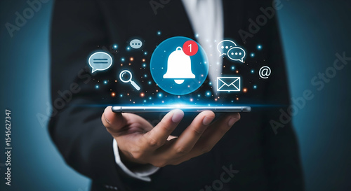 Businessman Using Phone with Email Notification Icon. Email Notification Alert with Smartphone in Hand concept ,Email Pop-Up Alert with Smartphone, Email and Text Message Notification on Mobile Device
