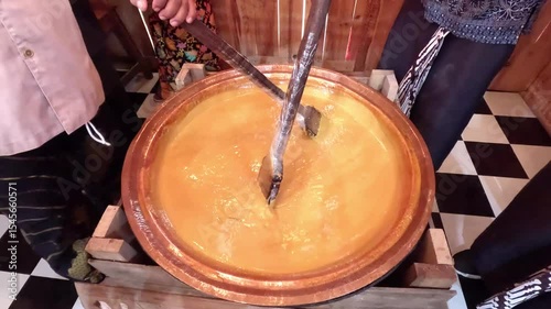 The process of making jenang. Jenang is an Indonesian traditional snack made from a mixture of glutenous rice, brown sugar and coconut milk.