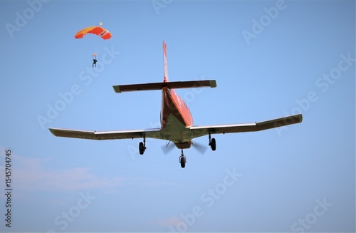 Airplane and a skydiver
