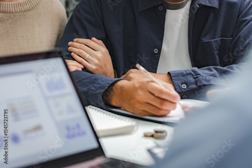 Married couple consulting with financial advisor for investment and savings planning, supportive relationship and financial decision making together