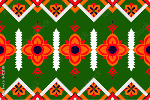 Colorful ethnic seamless pattern with flowers and diam.