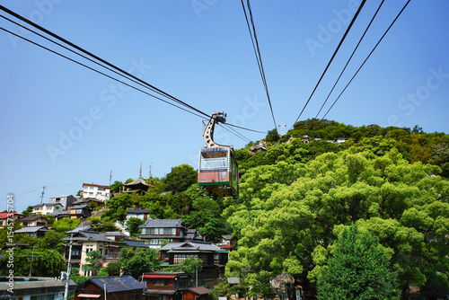 View of a cable car of the Onomichi Ropeway as it ascends to Mount Senkoji
