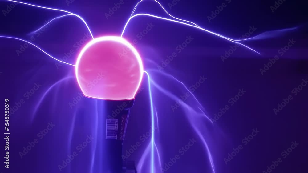 Captivating plasma ball with luminous filaments dancing against a dark backdrop video
