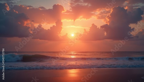 Dramatic sunset over the ocean waves.