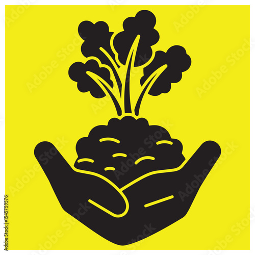 A black silhouette of a growing plant held in open hands on a yellow background