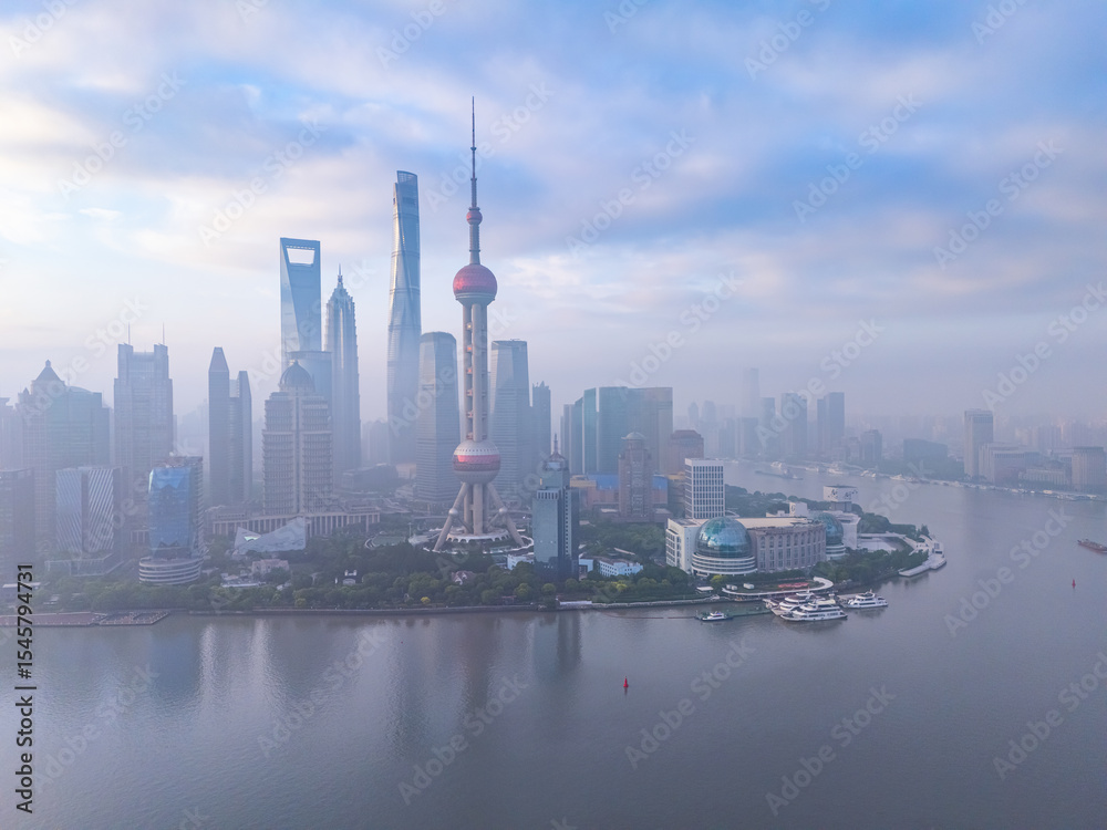 Fototapeta premium Aerial view of Shanghai skyline in downtown at sunrise.