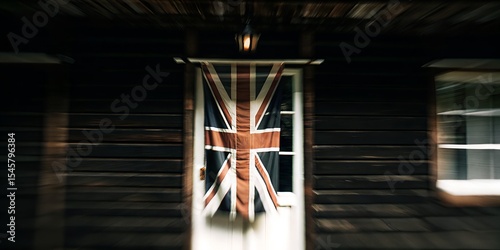 Union jack flag draped over a rustic wooden doorway