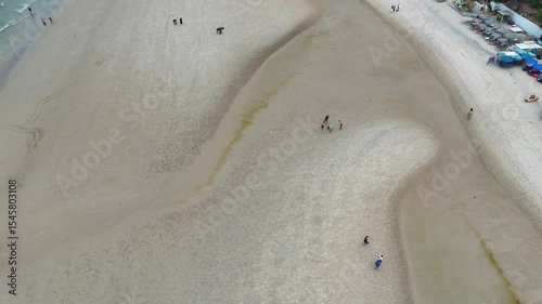 Coastal town and beach from skyward perspective