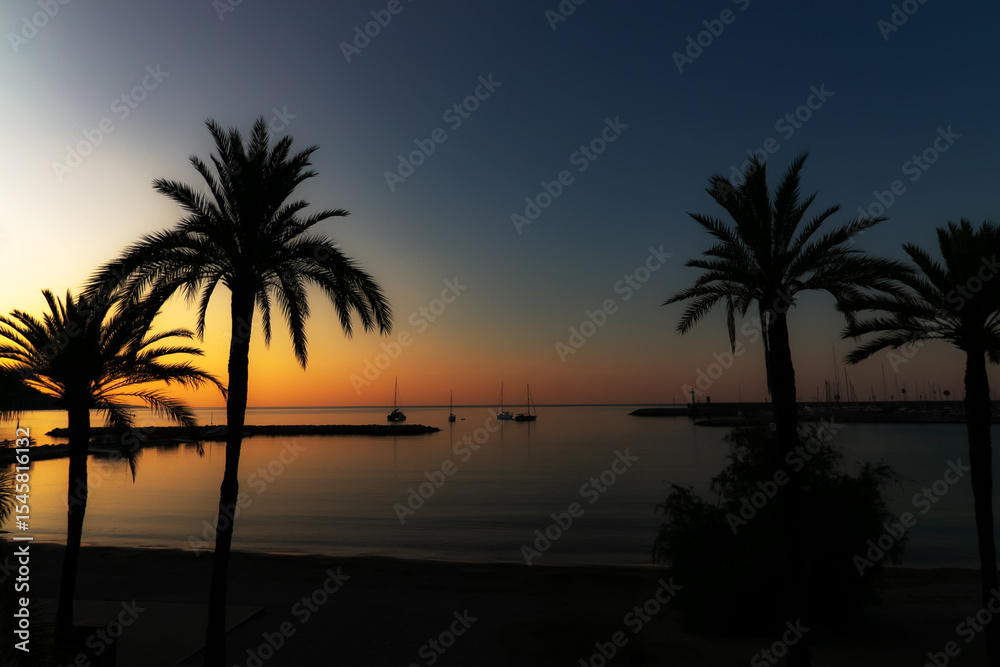 Obraz premium Sunset view over a beech in Cote D´azur -Mediteranian sea