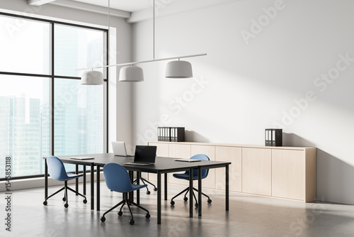 Wallpaper Mural Modern minimalist office interior with large windows and blue chairs in bright workspace setting, featuring clean design and natural lighting. 3D Rendering Torontodigital.ca