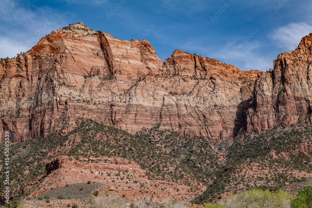 Fototapeta premium Zion Canyon (Little Zion, Mukuntuweap, Mu-Loon'-Tu-Weap Straight Cañon; weap is Paiute for canyon) is a deep and narrow gorge in southwestern Utah, carved by the North Fork of the Virgin River.