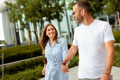 Couple enjoying a sunny str...