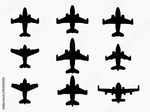 Collection of Airplane Silhouettes in a Grid Pattern Against a White Background