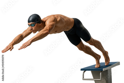 Male swimmer diving off starting block with extended arms and focus