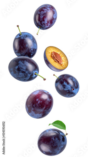 Ripe plums tumbling, displaying juicy flesh and dark pit against transparent surface