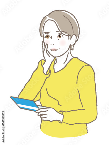 通帳を持って困った顔をする中高年女性