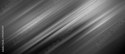 Diagonal abstract Monochrome black and white light beam gradient, soft motion blur grain noise texture. moody cinematic overlay, analog retro grayscale, banner header poster website background.