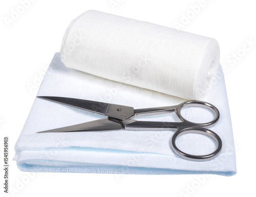 Sharp stainless steel bandage scissors are lying on a piece of white gauze near a roll of medical bandage, isolated on a transparent background, ready for use in first aid or medical procedures