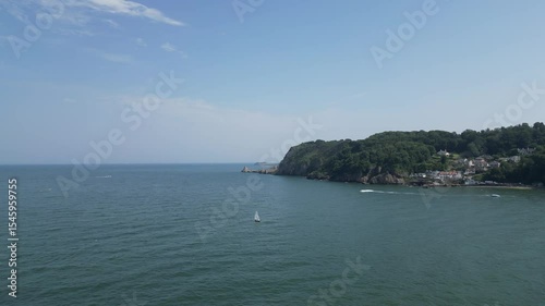 Babbacombe, South Devon, England: DRONE VIEWS: Flying across Babbacombe Bay towards Long Quarry Point, the coastline and various motor boats. South Devon is a popular UK holiday destination.
