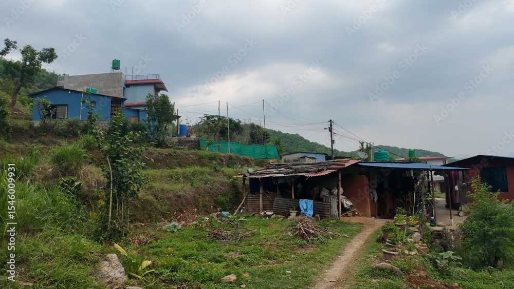Rustic Huts Amidst Mountain Scenery: A Glimpse of Rural Village Life in Nature Rustic Huts Amidst Mountain Scenery: A Glimpse of Rural Village Life in Nature