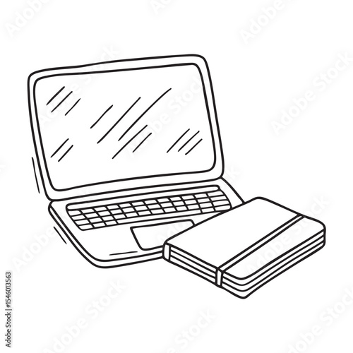 A table holding a closed laptop and an empty notepad