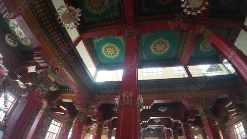 Colorful Painted Ceiling and Ornate Columns at Zhong Hua Chinese Buddhist Monastery Entrance in Lumbini, Nepal