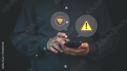 Person holding a smartphone with no Wi-Fi and warning alert icons, representing connection failure, network error, or internet outage issue.