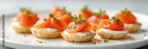 Elegant red salmon & cream cheese canap?s on white , snack, hors d'oeuvre, meal